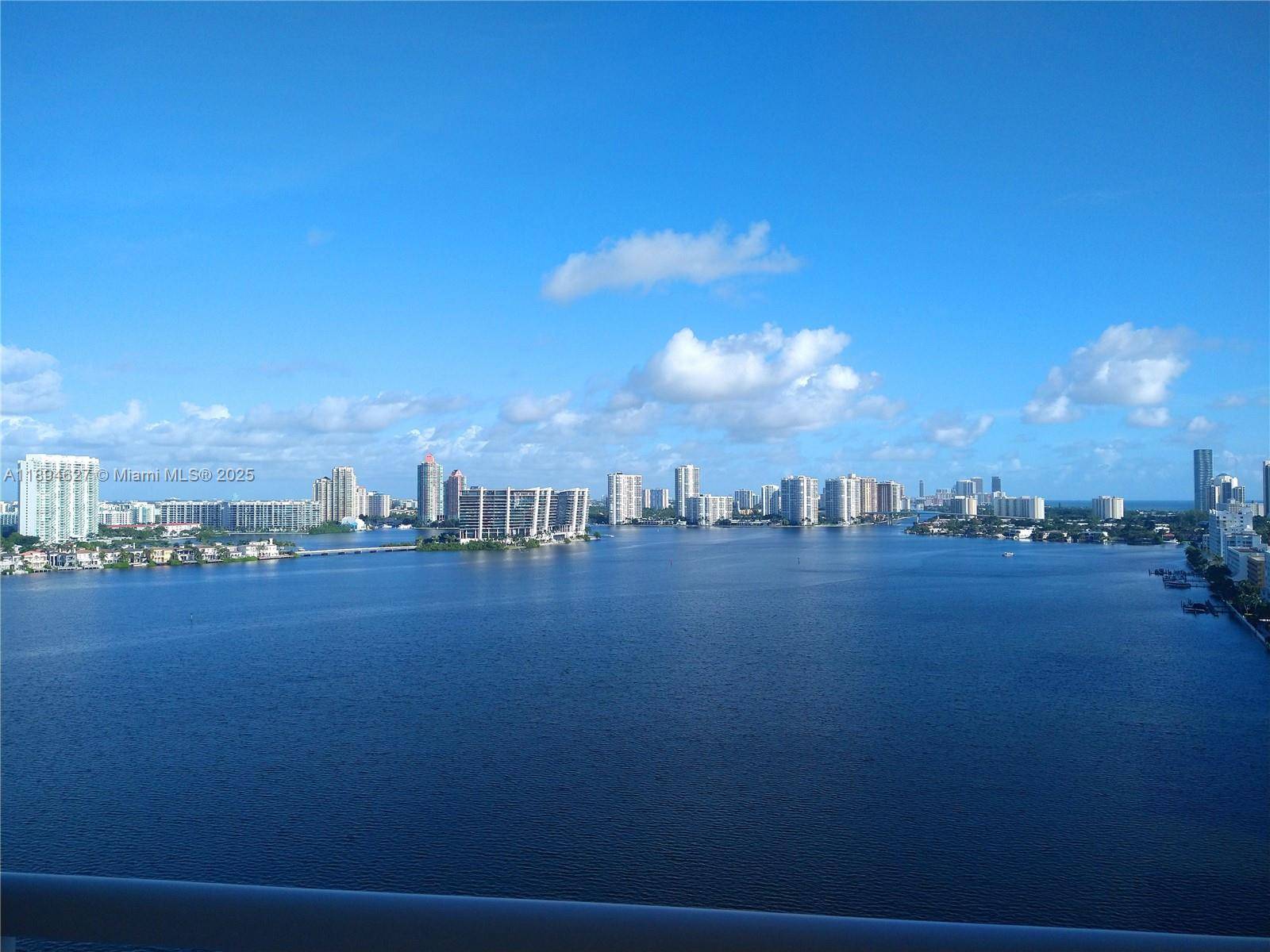 Spacious 2 bedroom, 2 bathroom unit in original condition with beautiful views of Intracoastal Waterway, ocean and the Sunny Isles Skyline.
