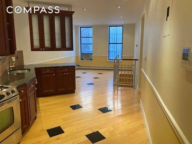 READY FOR SUMMER ? Come fast to view this gorgeous 3 BR, 2 full bath DUPLEX condominium on a tree lined street with your own outdoor deck.