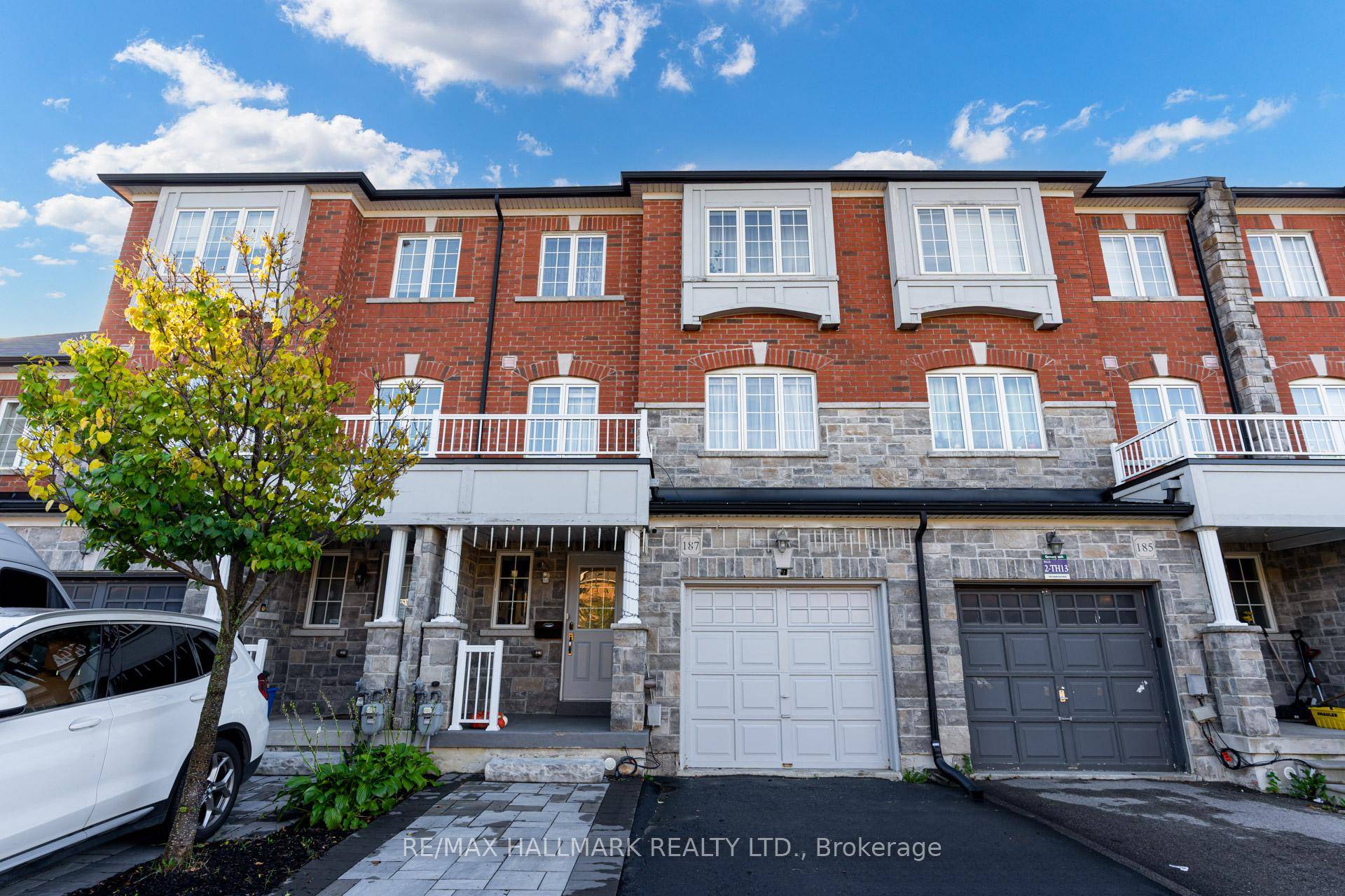 Welcome to 187 Hawkview Blvd, a stunning 3 bedroom, 4 bathroom townhome located in the heart of Vellore Village.