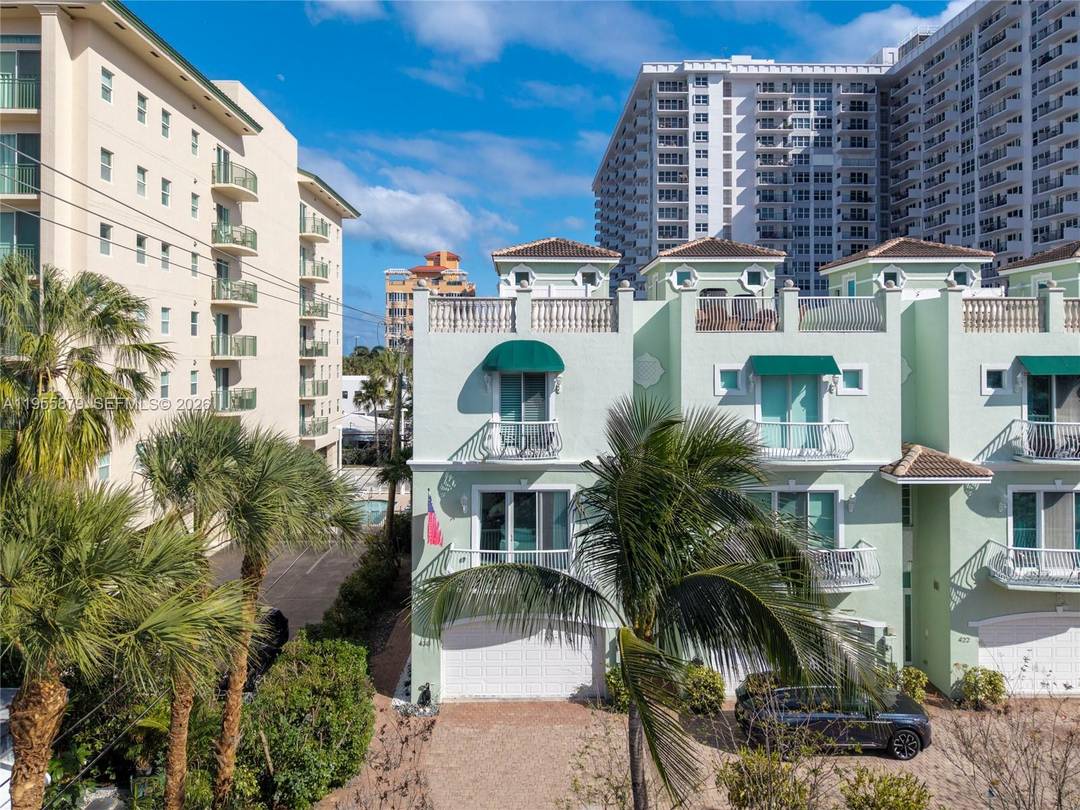 Experience the pinnacle of Pompano Beach living in this rare, tri level corner residence located in an exclusive 5 unit boutique development.