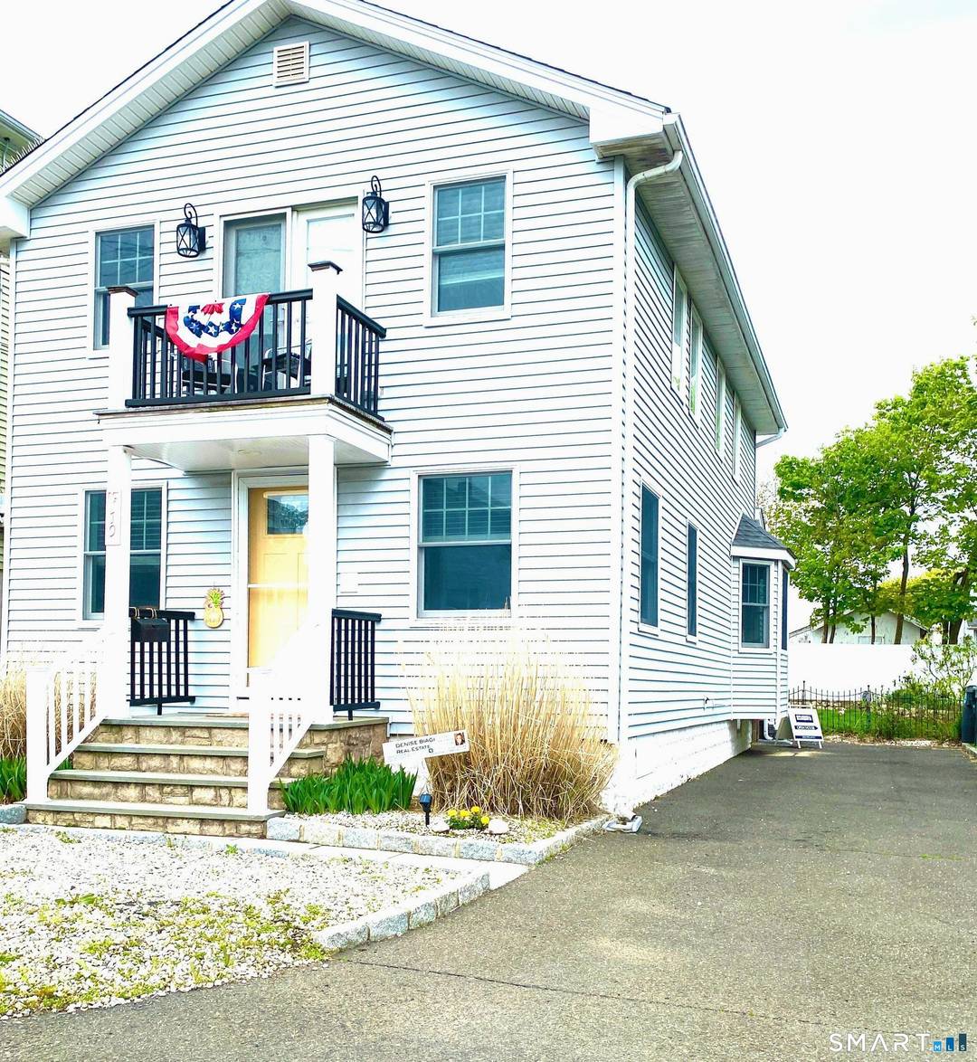 This is your opportunity to own this Classic beach house in the vibrant Point beach community, walk to water and enjoy clear water views from your bedroom balcony.