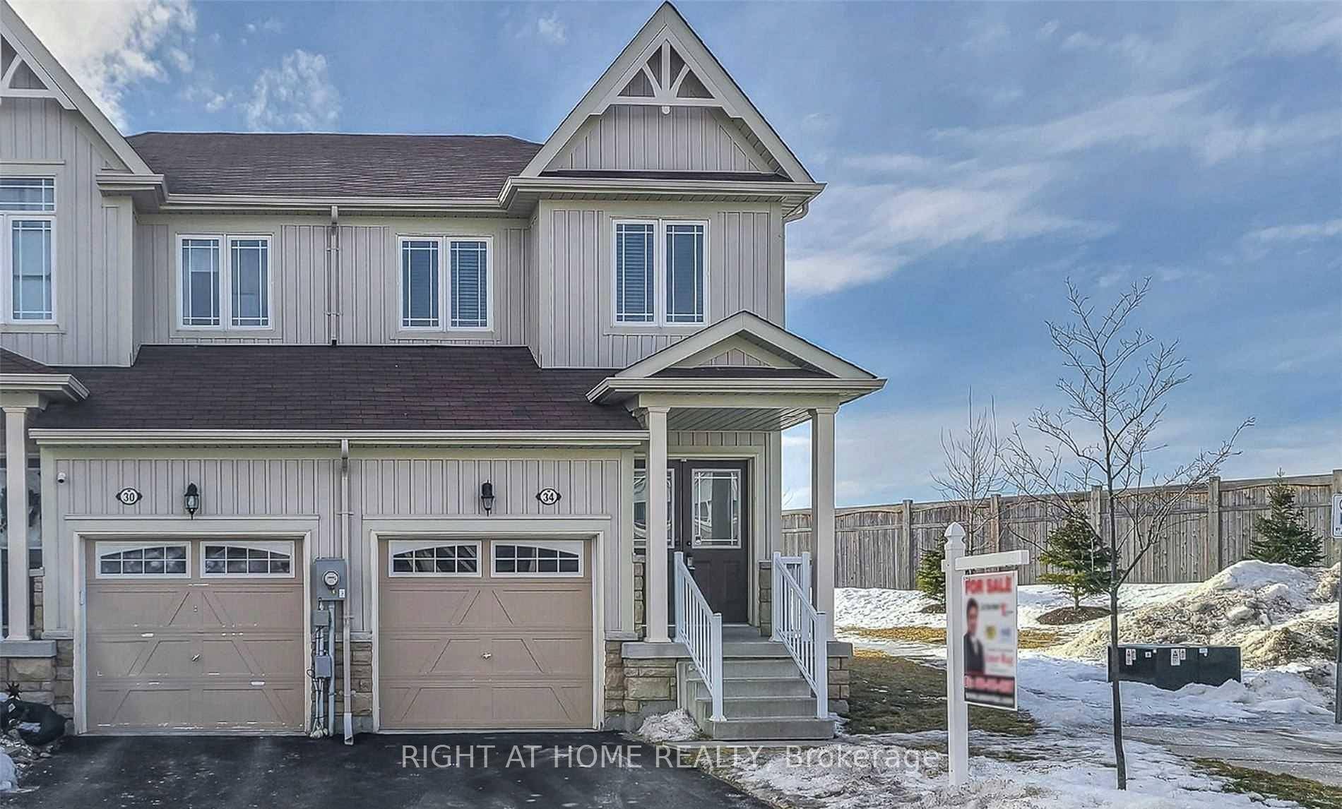 Stylish and spacious executive end unit townhome in a sought after family friendly community.