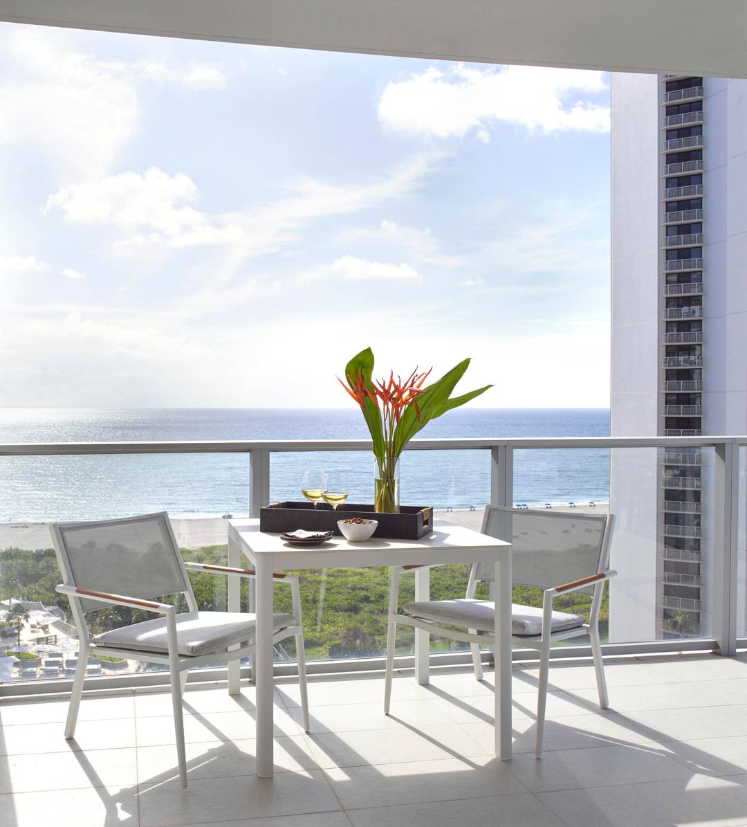 Experience luxury oceanfront living in this fully furnished, turnkey residence on the 11th floor of the newly completed Peace Tower at Amrit Ocean Resort Residences.