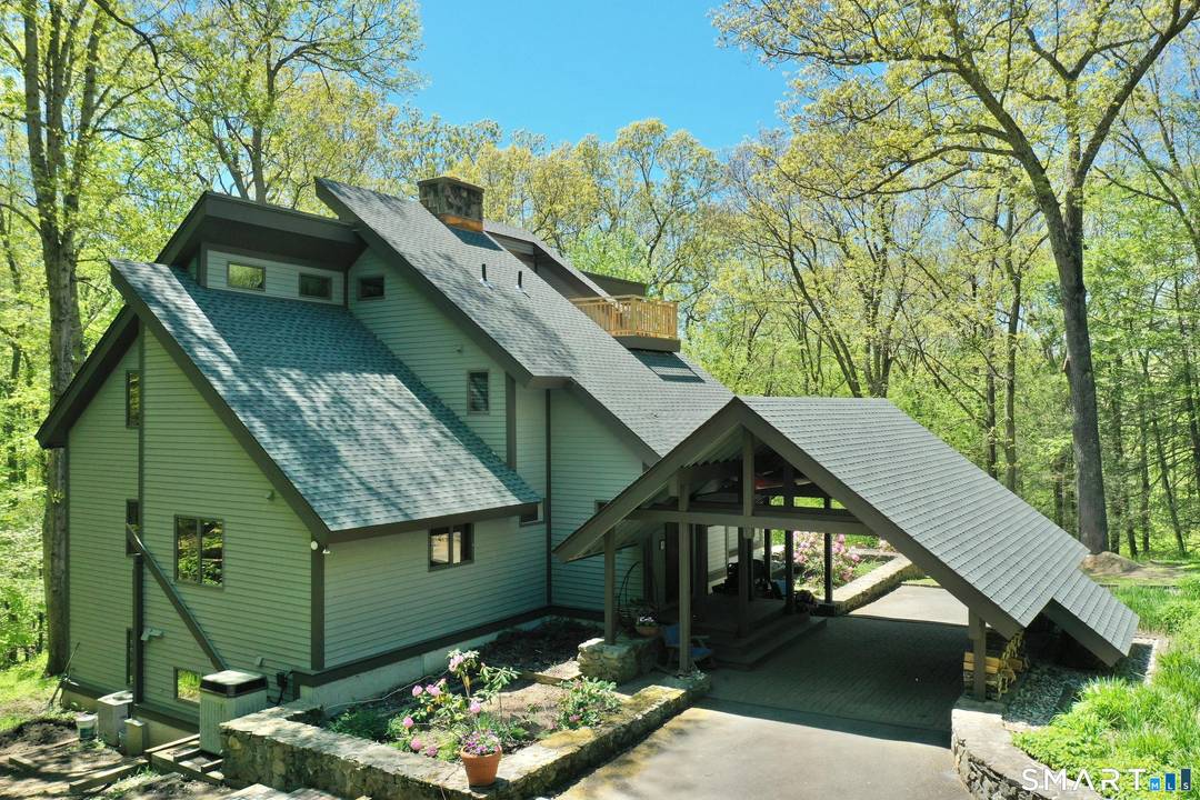 Enjoy the convenience and benefits of Southbury with the privacy and character of a country retreat.