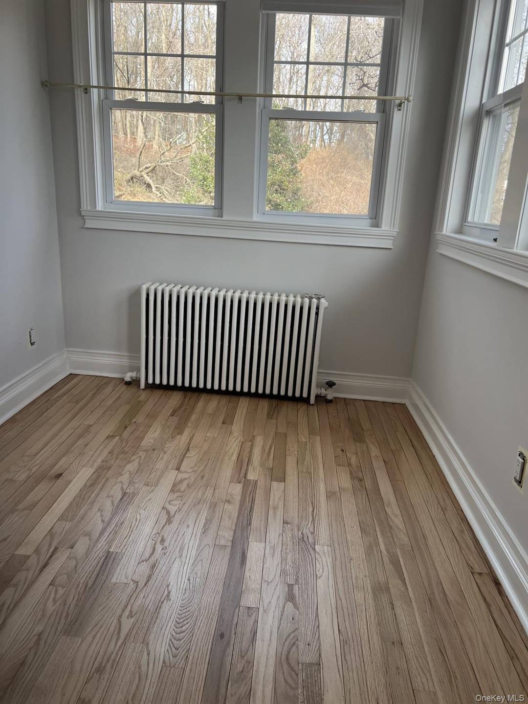 Multi family home 1st floor freshly painted 3 bedroom and 1 bathroom apartment.