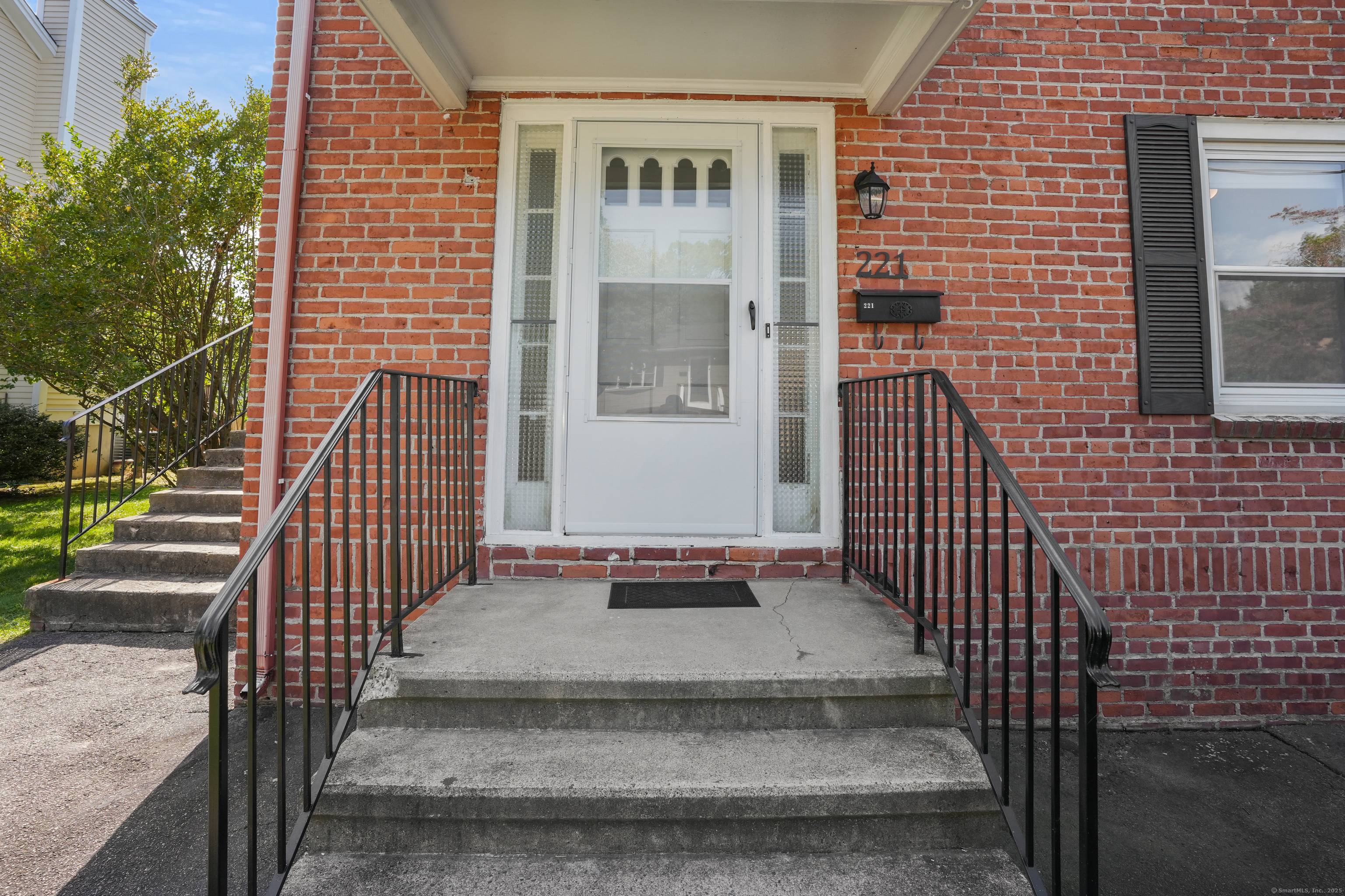 Beautifully maintained brick two family in Fairfield's sought after Holland Hill neighborhood.