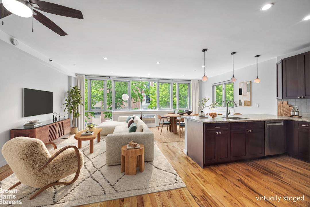 Residence 2 commands an entire floor in a boutique condominium building in the vibrant and authentic East Harlem neighborhood.