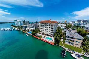 Spacious and bright 2 bedroom, 2 bath residence featuring additional storage, two assigned parking spaces, and an in unit washer and dryer, located in one of Bay Harbor s best ...