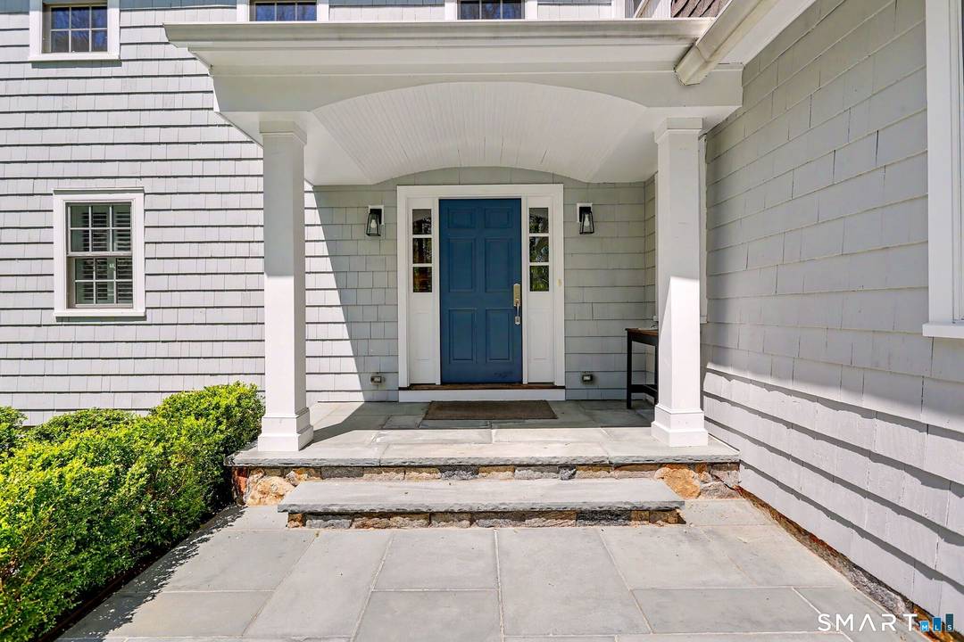 Welcome to 4 Cardinal Lane a beautifully expanded and thoughtfully updated home set on two private, level acres in one of Westport's most desirable cul de sac neighborhoods.