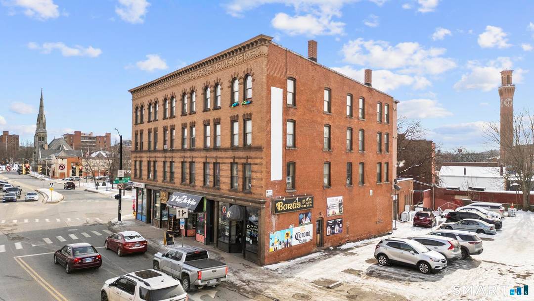 Exceptional mixed use investment opportunity Downtown featuring three contiguous parcels totaling 0.