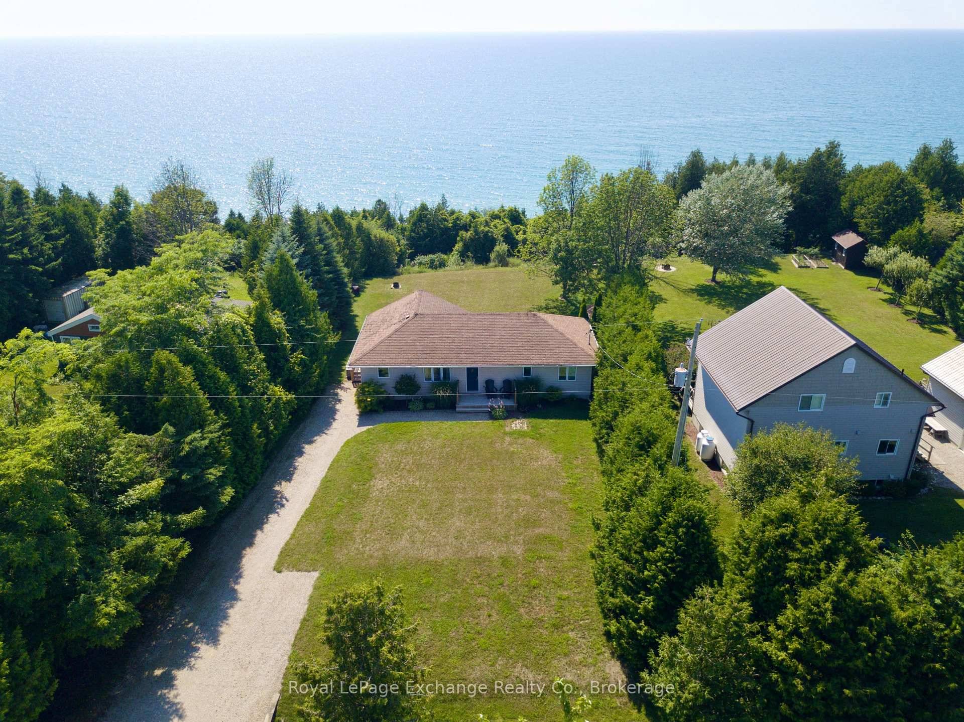 Welcome to 85435 McDonald Line, a stunning lakefront bungalow in a peaceful Ashfield Colborne Wawanosh community.