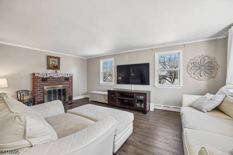 Oversized 4 Bedroom Cape Cod in Prime Commuter Location !