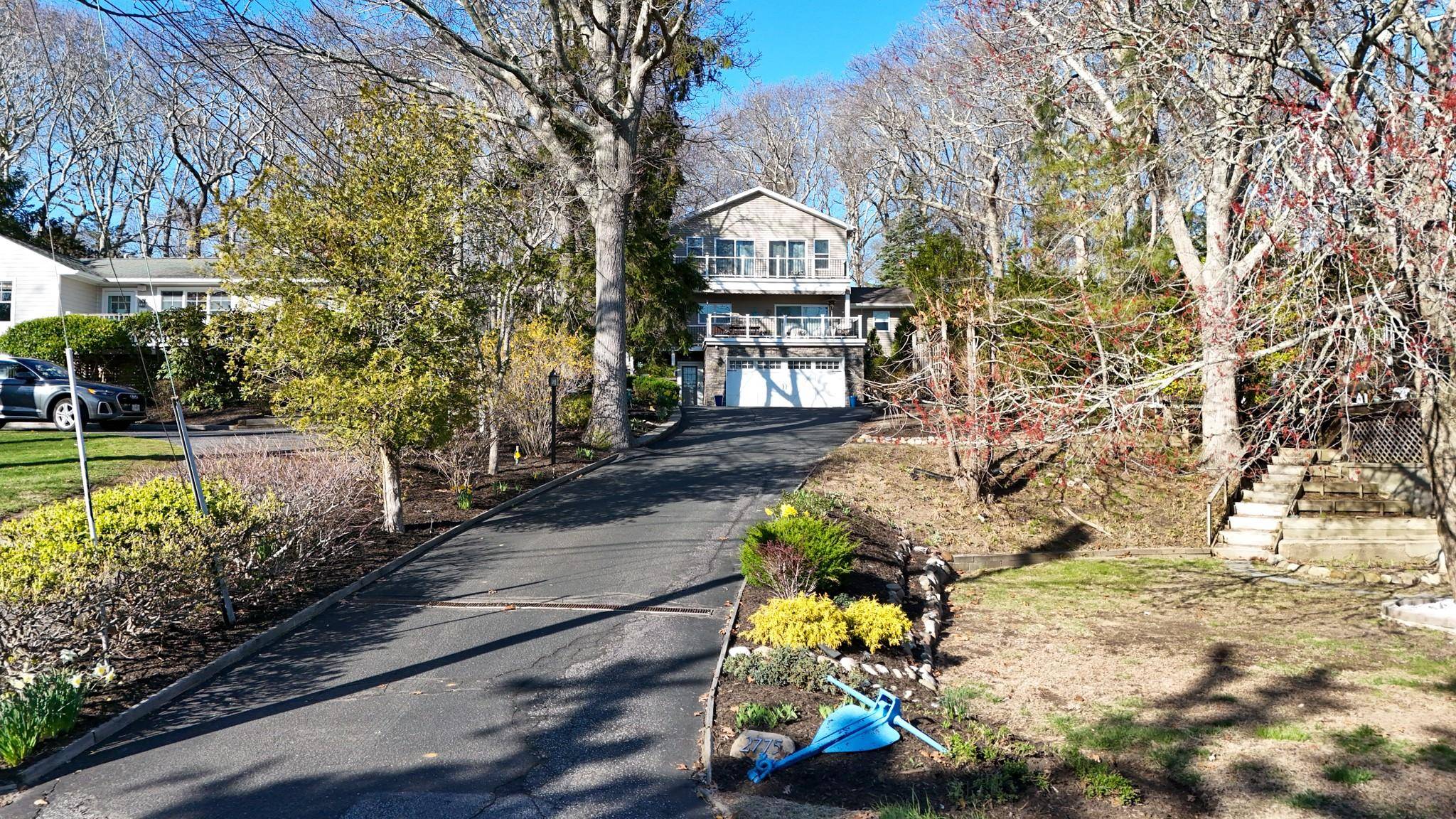 Meticulously maintained home with stunning water views in beautiful Fleet's Neck community !