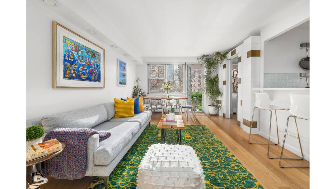 With great attention to detail, this sun filled custom built and mint north east corner converted three bedroom one bathroom home resides at Lincoln Guild, a full service mid century ...