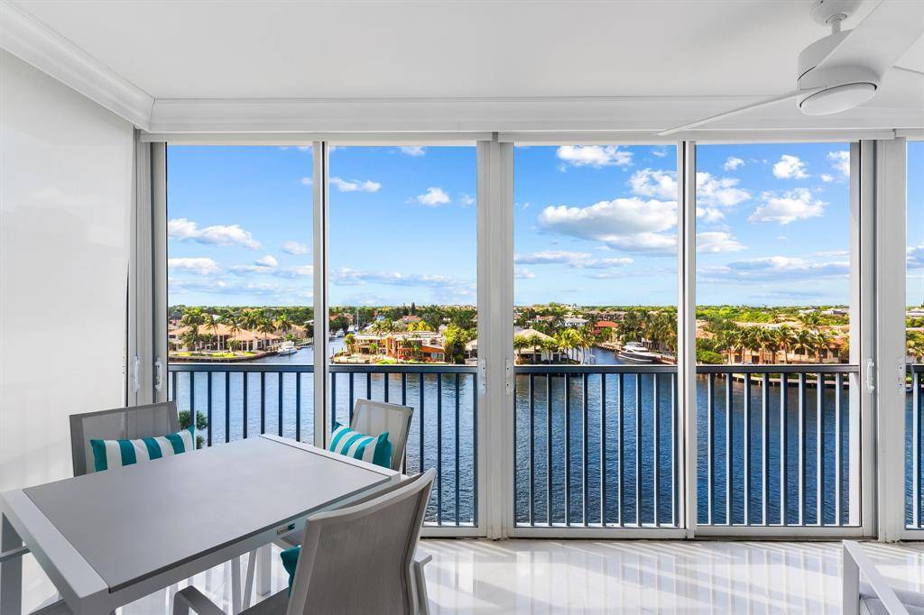 SEASONAL RENTAL ! Completely furnished and totally renovated corner condo with 2 split primary suites that offers unobstructed INTRACOASTAL SUNSET views and PRIVATE BEACH ACCESS just across the street !