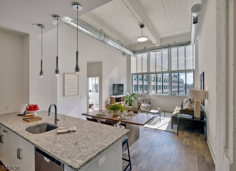 Experience luxury living in this spacious two bedroom, two bath residence at Edison Lofts.