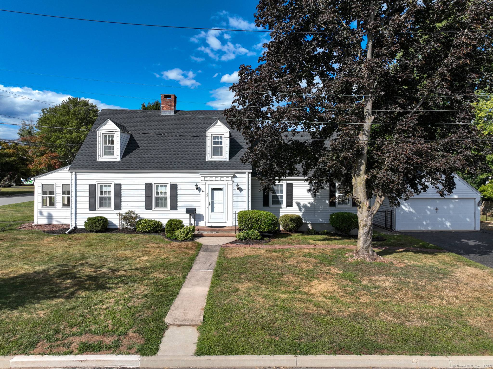 This charming home offers a spacious living room with a cozy gas fireplace, perfect for relaxing evenings.