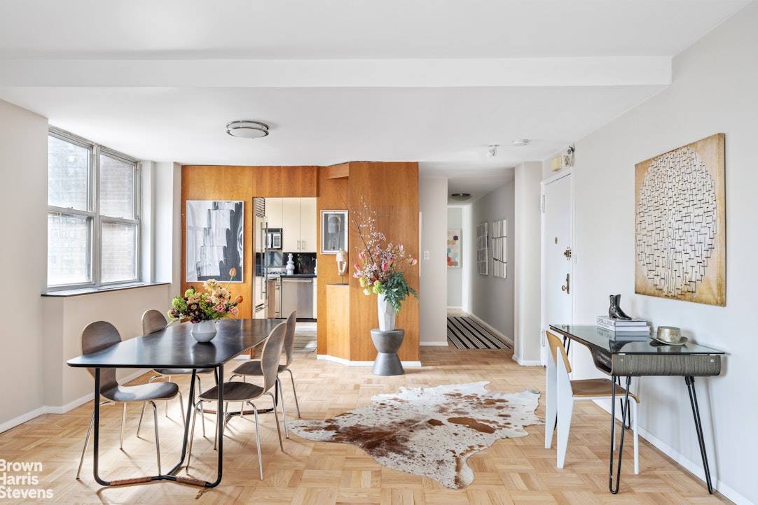 Apartment 16G is a generously proportioned one bedroom residence, offering both a full bathroom and a convenient powder room off the foyer.