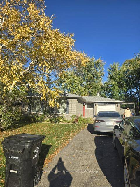 Spacious 3 Bedroom Detached Bungalow Main Floor Only with private garage and driveway parking.