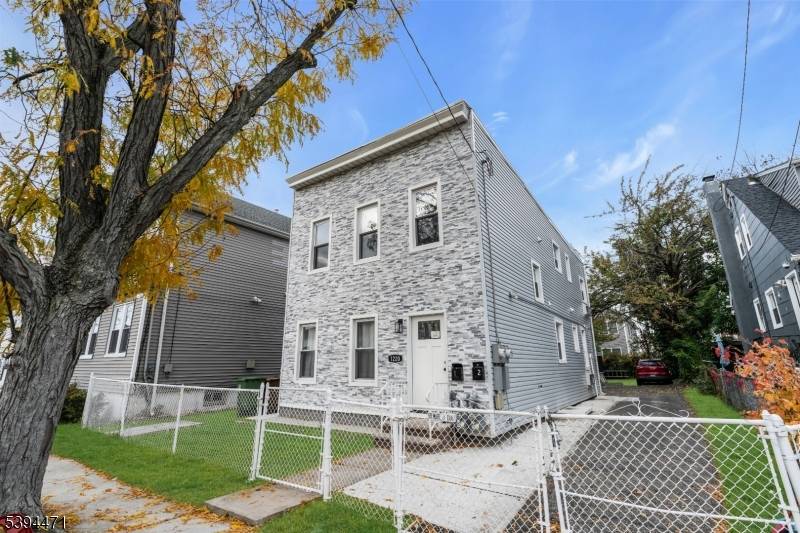 Beautifully renovated 2 family home showcasing modern updates and strong income potential.