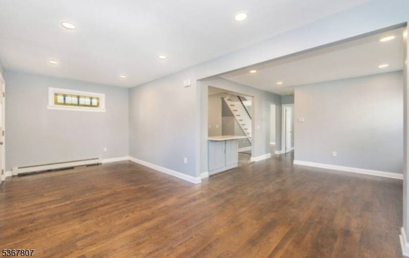 61 Princeton Street in Clifton, New Jersey, is an elevated Cape Cod style single family home The residence features four bedrooms, three full bathrooms, a modern kitchen with stainless steel ...