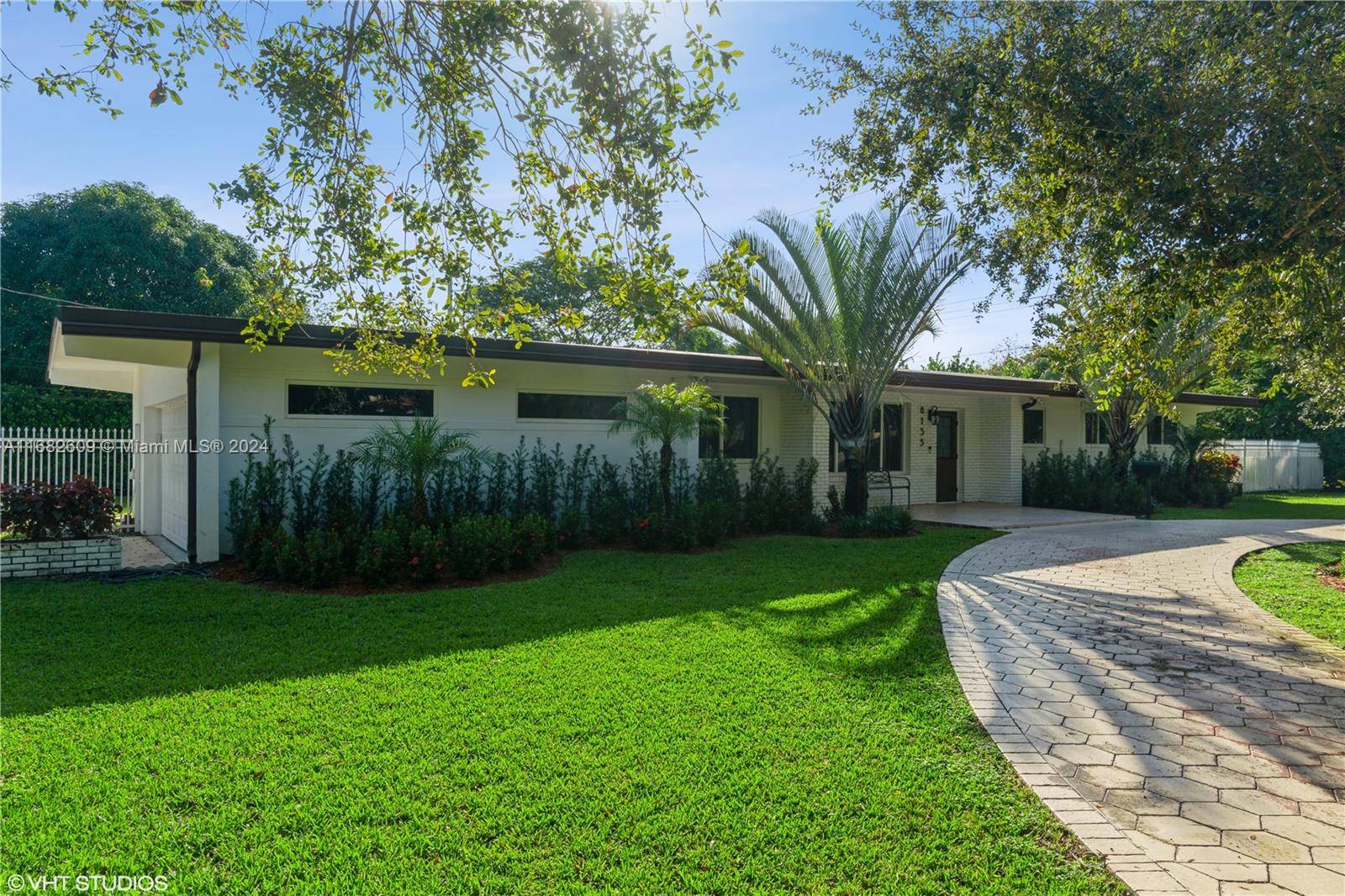 This beautifully renovated 4 bedroom, 2 bathroom home in Pinecrest combines a modern, minimalist design with luxurious features.