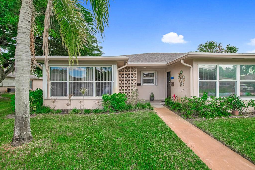 THIS UNIT IS A GREAT SIZE ONE FLOOR VILLA WITH PATIO TO RELAX OUT BACK.