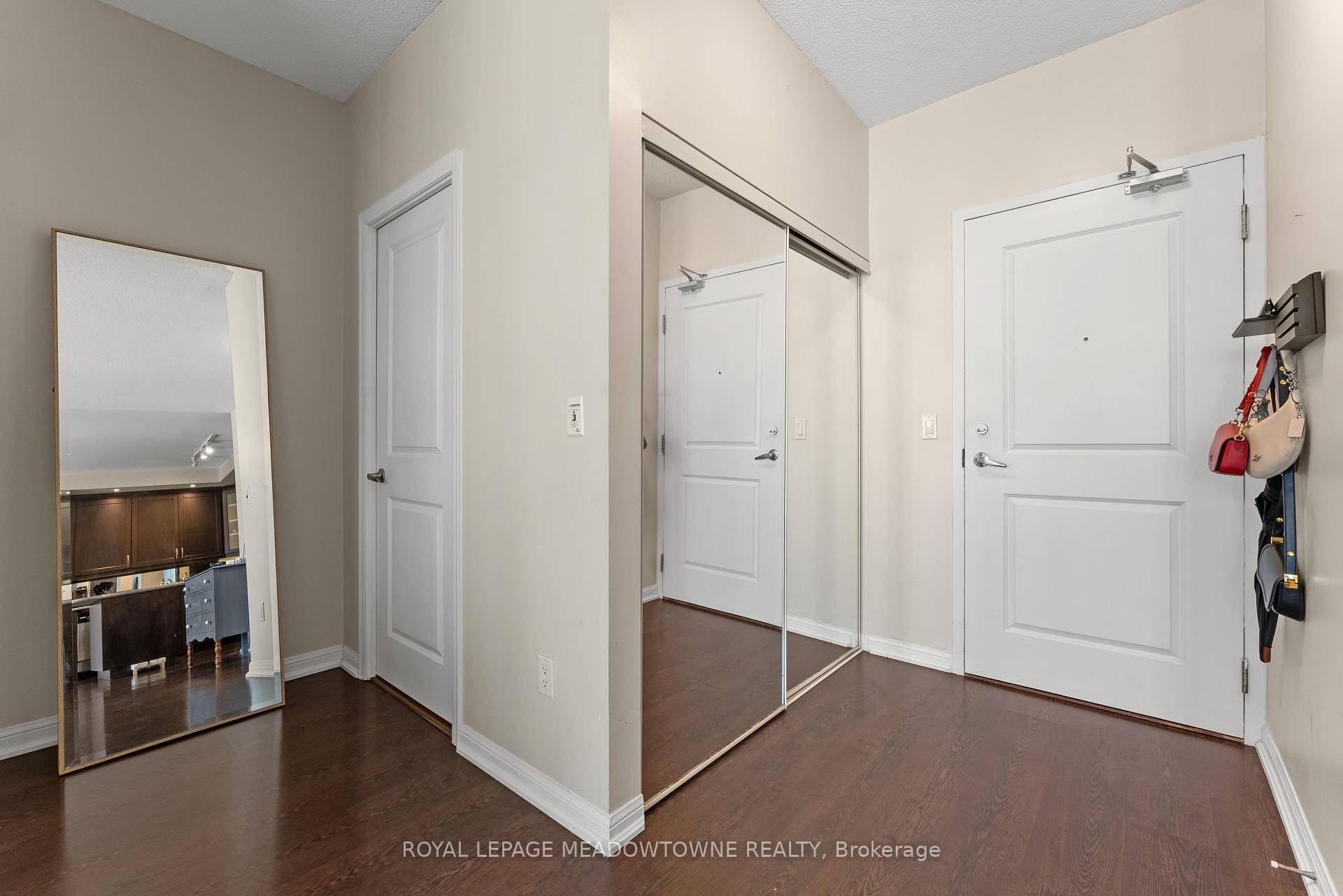 This stylish 650 sq ft suite offers a rare wide layout with hardwood floors throughout and floor to ceiling windows that drench the space in natural light.