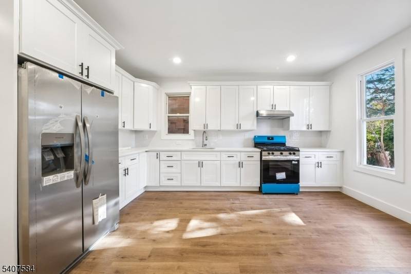 Location, Location ! Fully gutted and completely renovated two family home offering the rare opportunity to own a truly turnkey property in Jersey City.