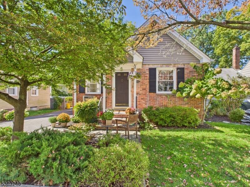 Welcome to this beautifully maintained Cape Cod Colonial, perfectly situated on a picturesque tree lined street with outstanding curb appeal.