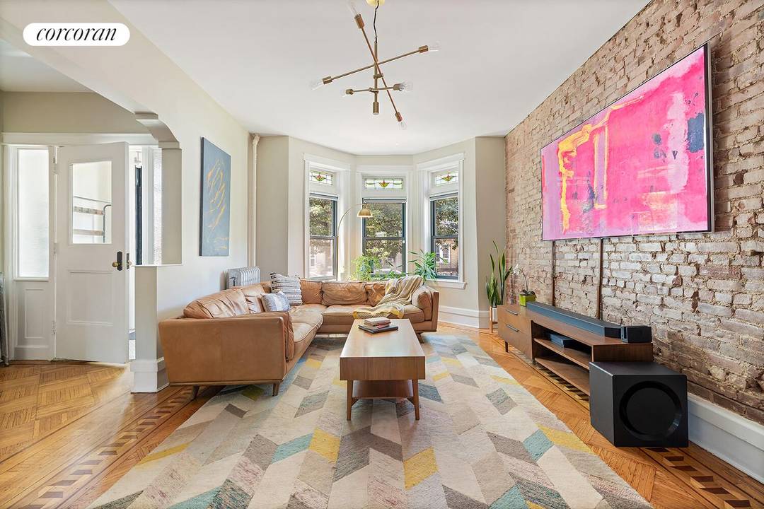 Welcome to this gorgeous turn of the century limestone townhouse located in the heart of Bay Ridge.