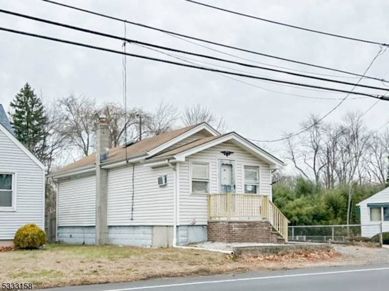 Transform this charming ranch home into your sanctuary !