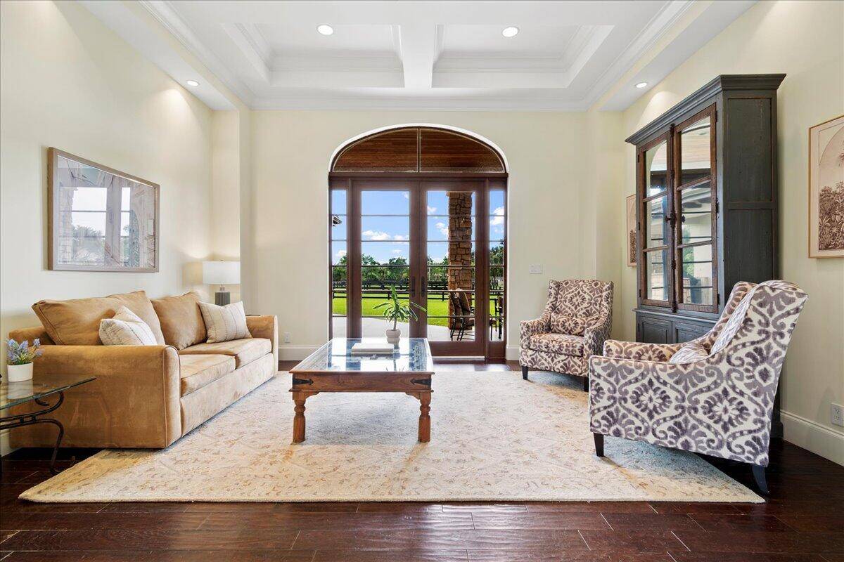 Amazing opportunity to be in a private home inside the exclusive enclave of Palm Beach Point, TRUE golf cart bike distance to WEF.