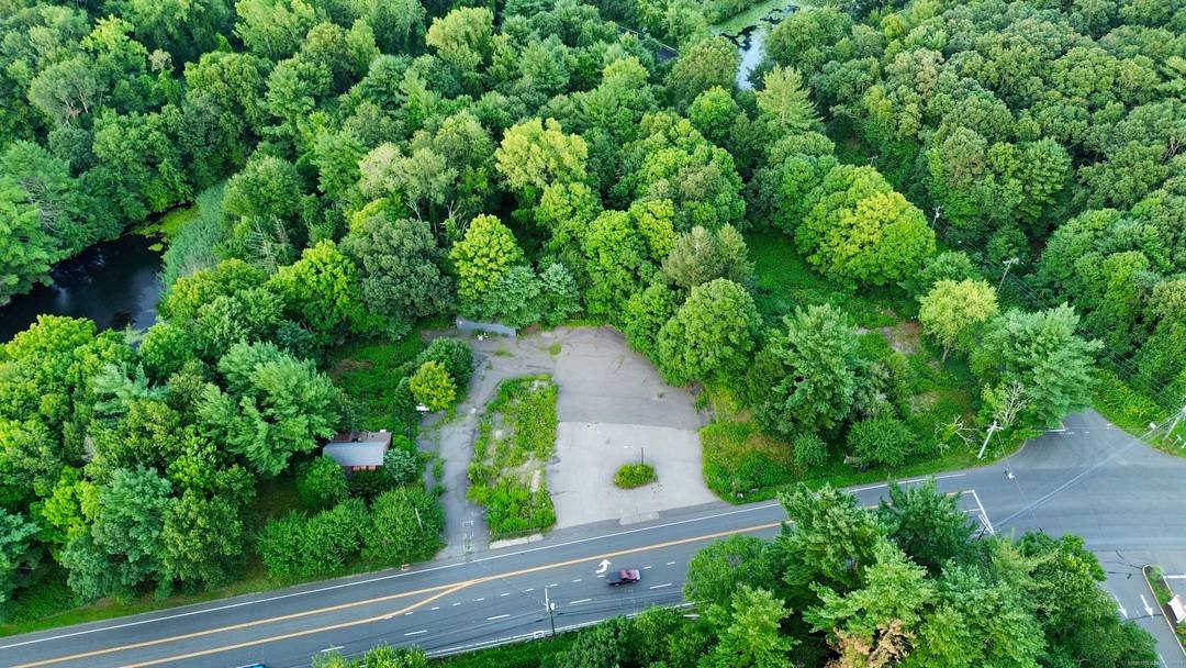 TWO adjacent commercial lots totaling 2.