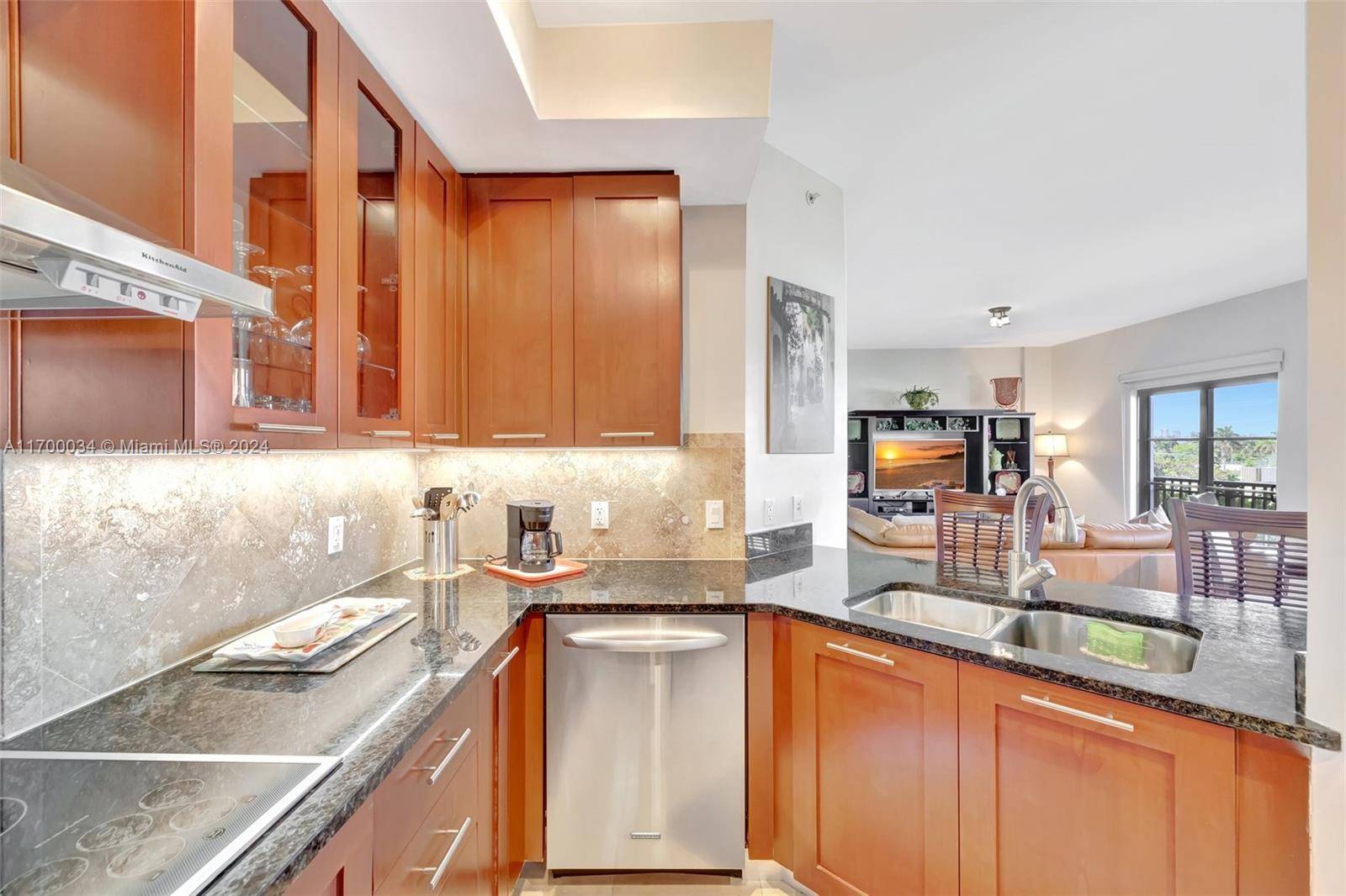 Discover this pristine rarely available 1 bedroom den residence in a boutique Mediterranean style building across from the beach.