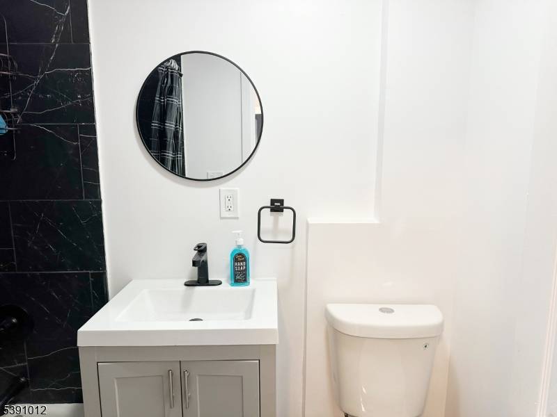 Welcome to this recently renovated single family home, a commuters dream in the Booming city of Newark.