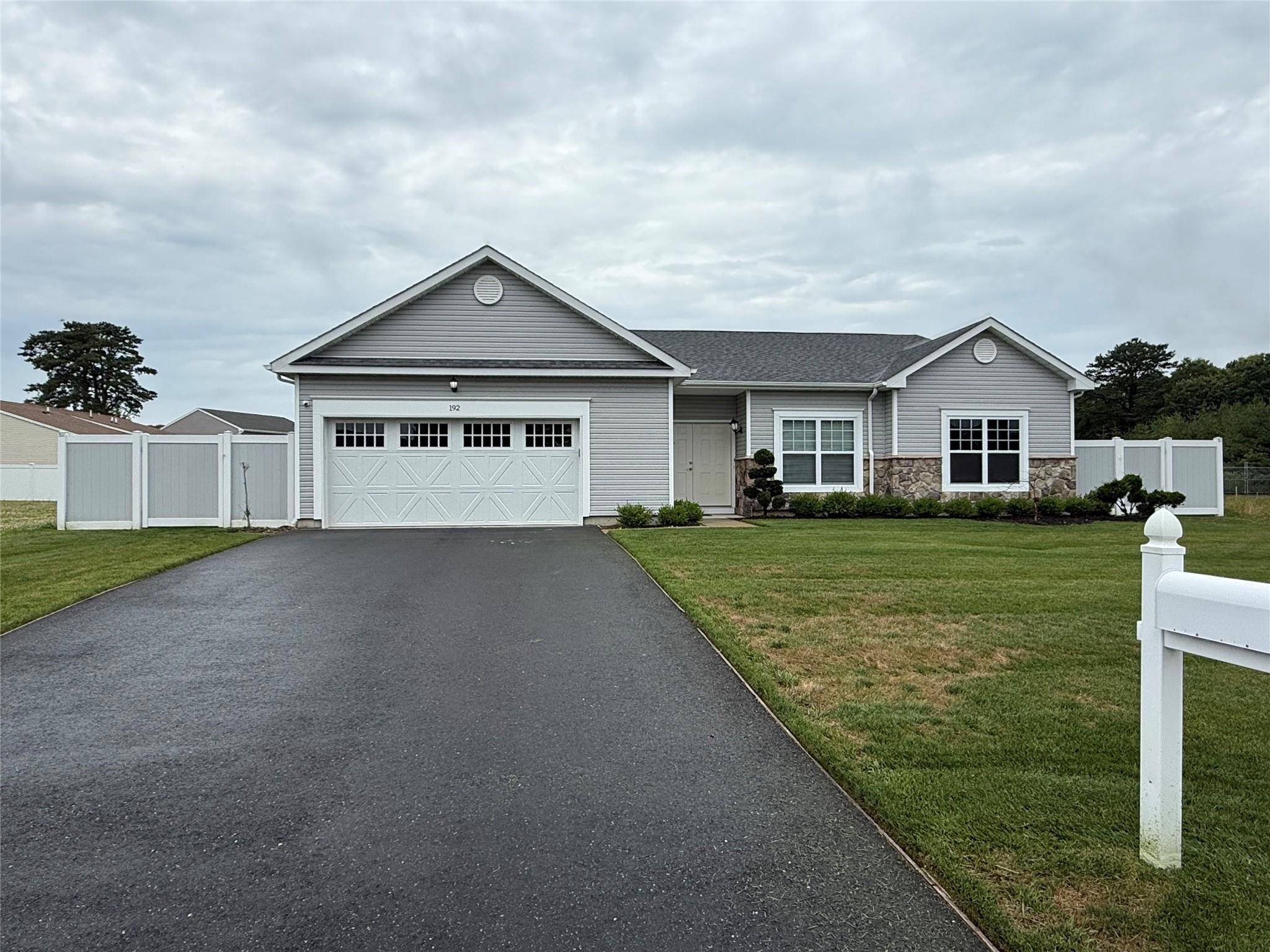 Welcome to this beautiful home in a private community in Shirley NY.