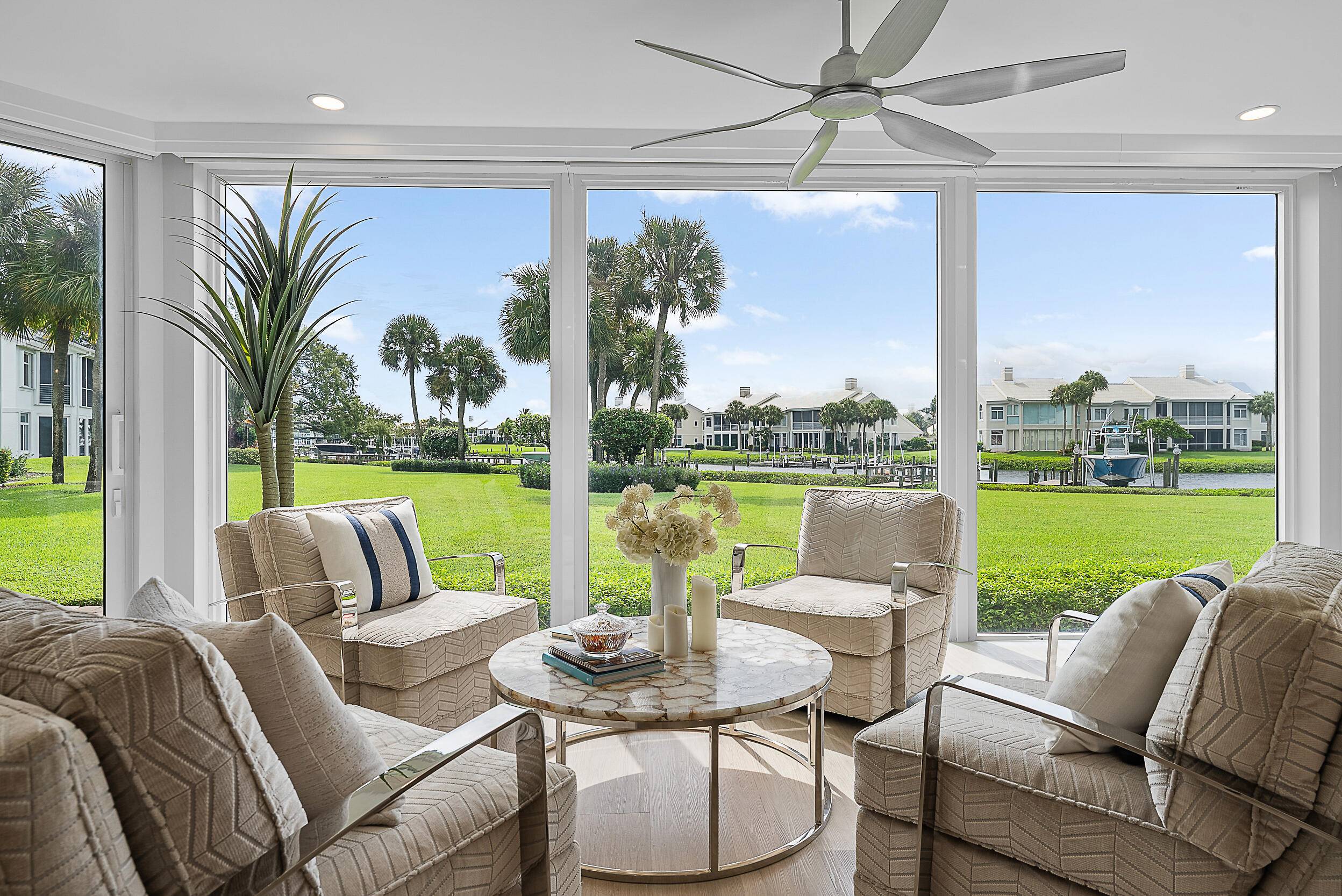 Welcome to waterfront elegance in the prestigious Admirals Cove community.
