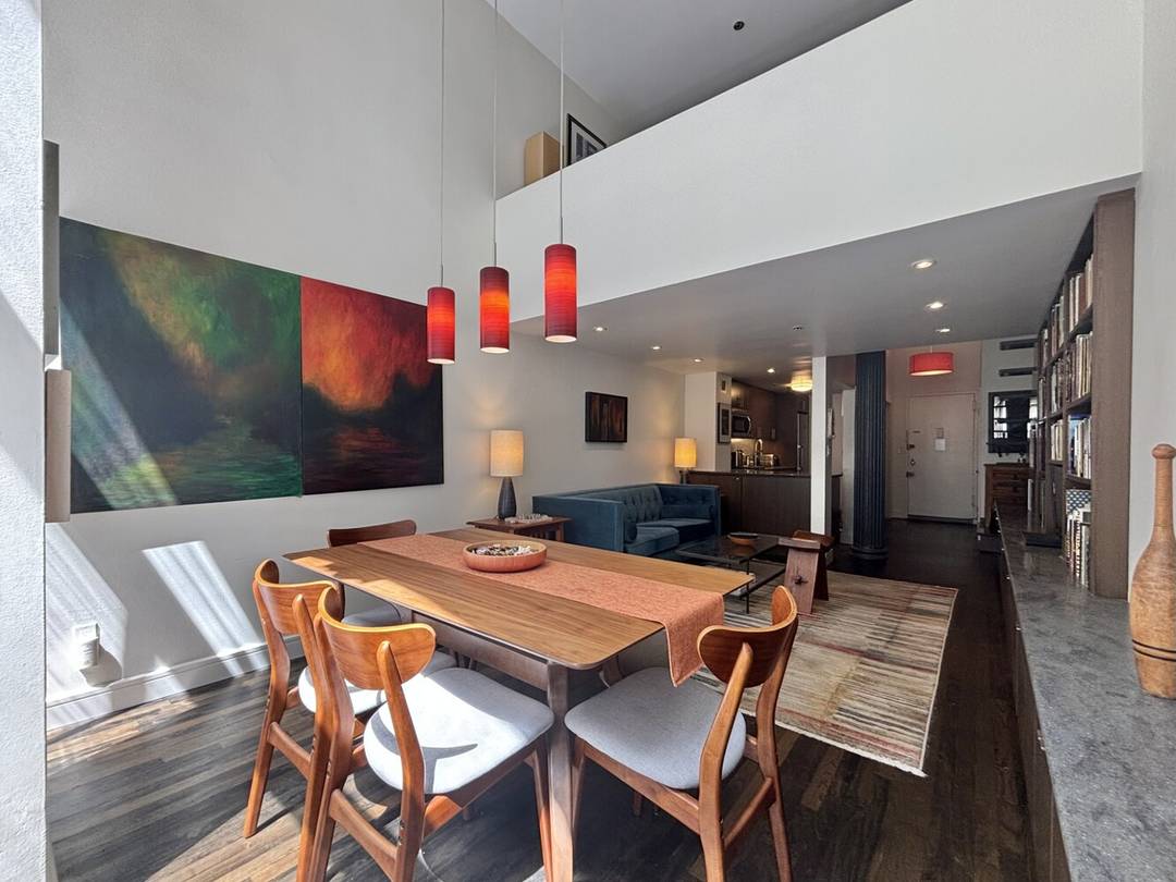 EXCELLENT CONDITION DOUBLE HEIGHT 16 WALL OF WINDOWS Bright, recently renovated duplex loft with 16 Ceiling in Greenwich Village's much sought after historic Cast Iron Building.