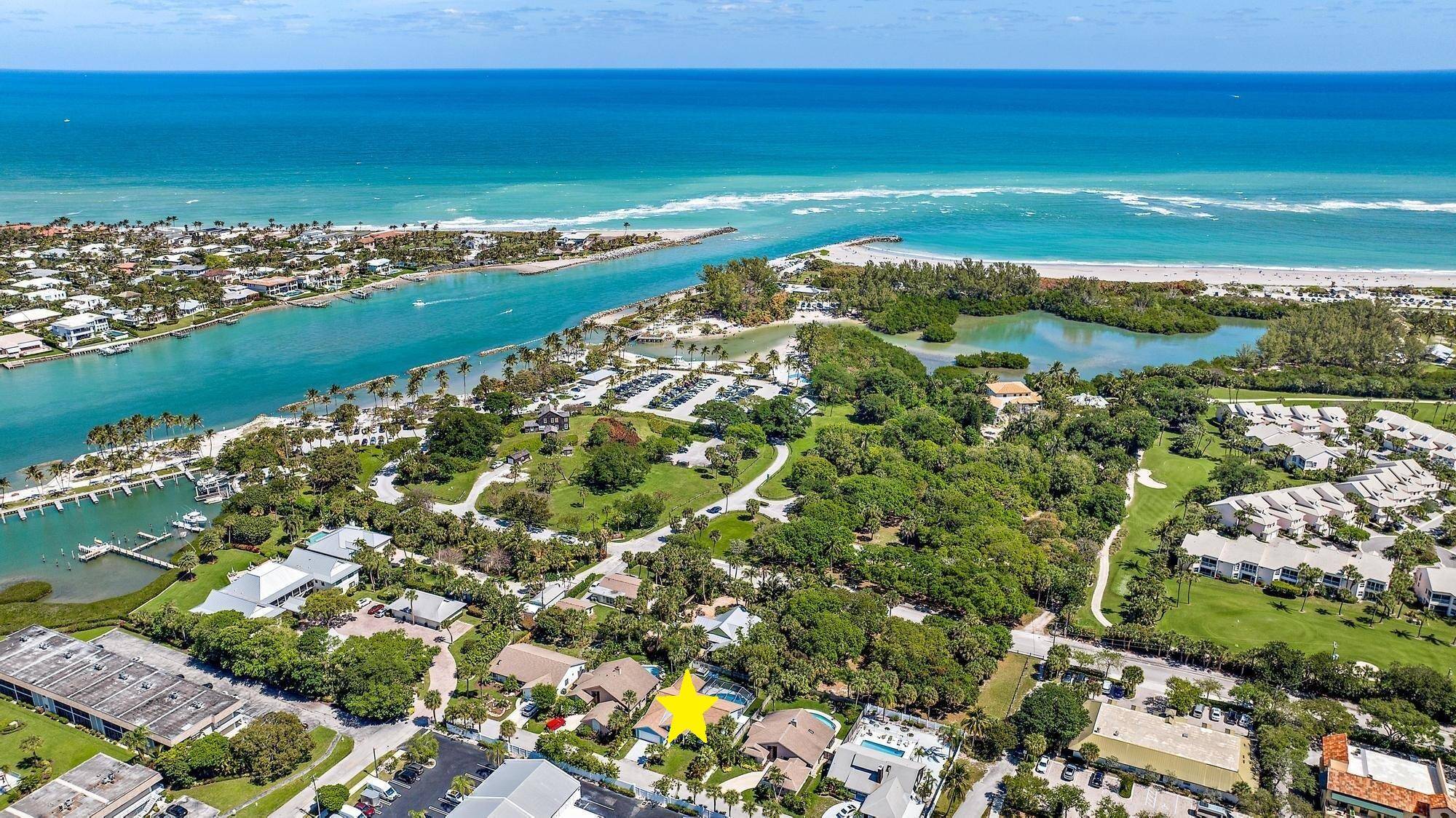 Private retreat nestled close to everything the Jupiter Inlet Village has to offer.