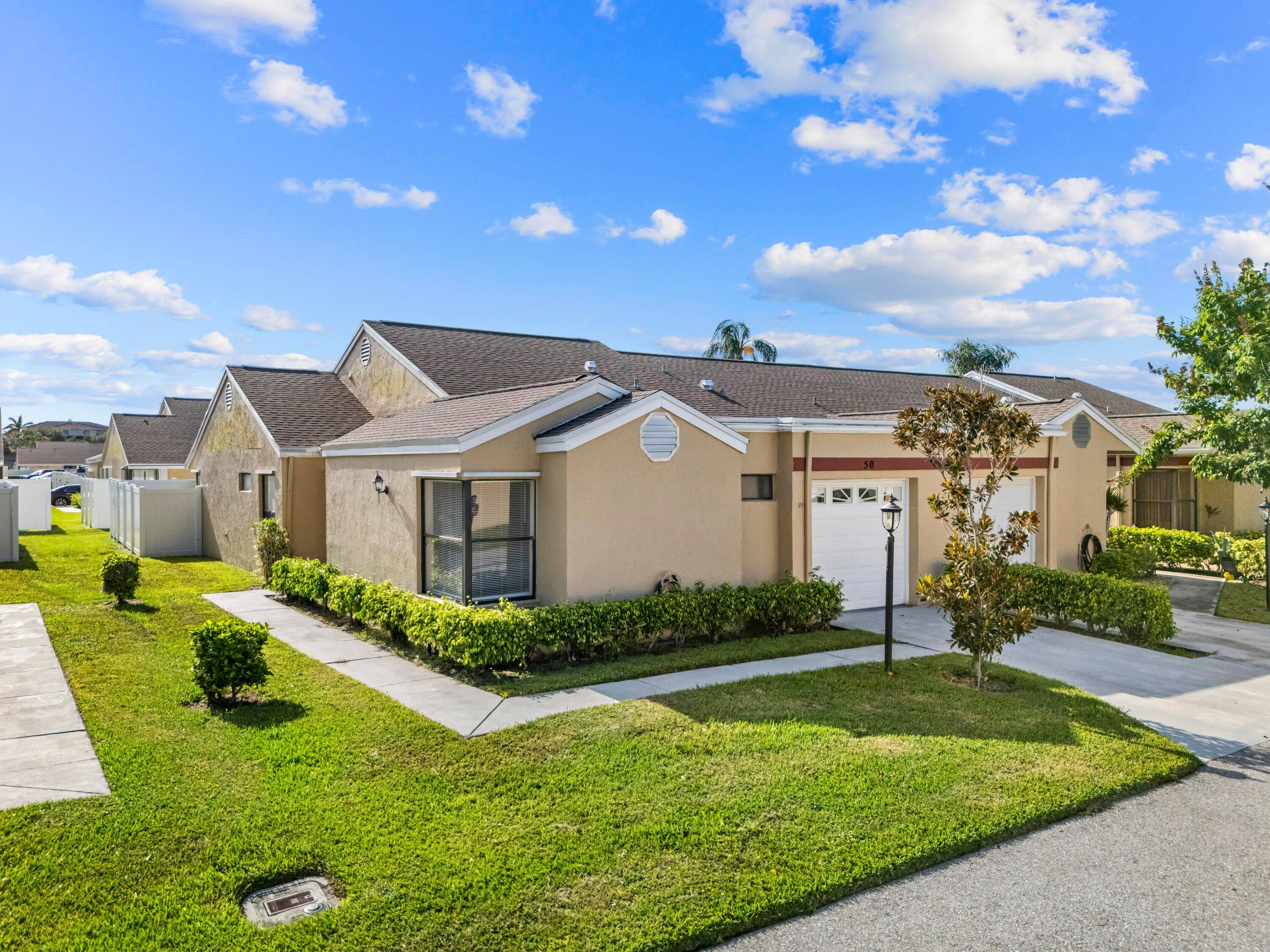 Charming single story villa featuring 3 beds and 2 baths.