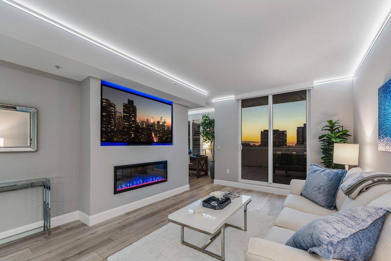 Live the ultimate downtown West Palm Beach lifestyle in this stunning 11th floor luxury residence at The Strand.