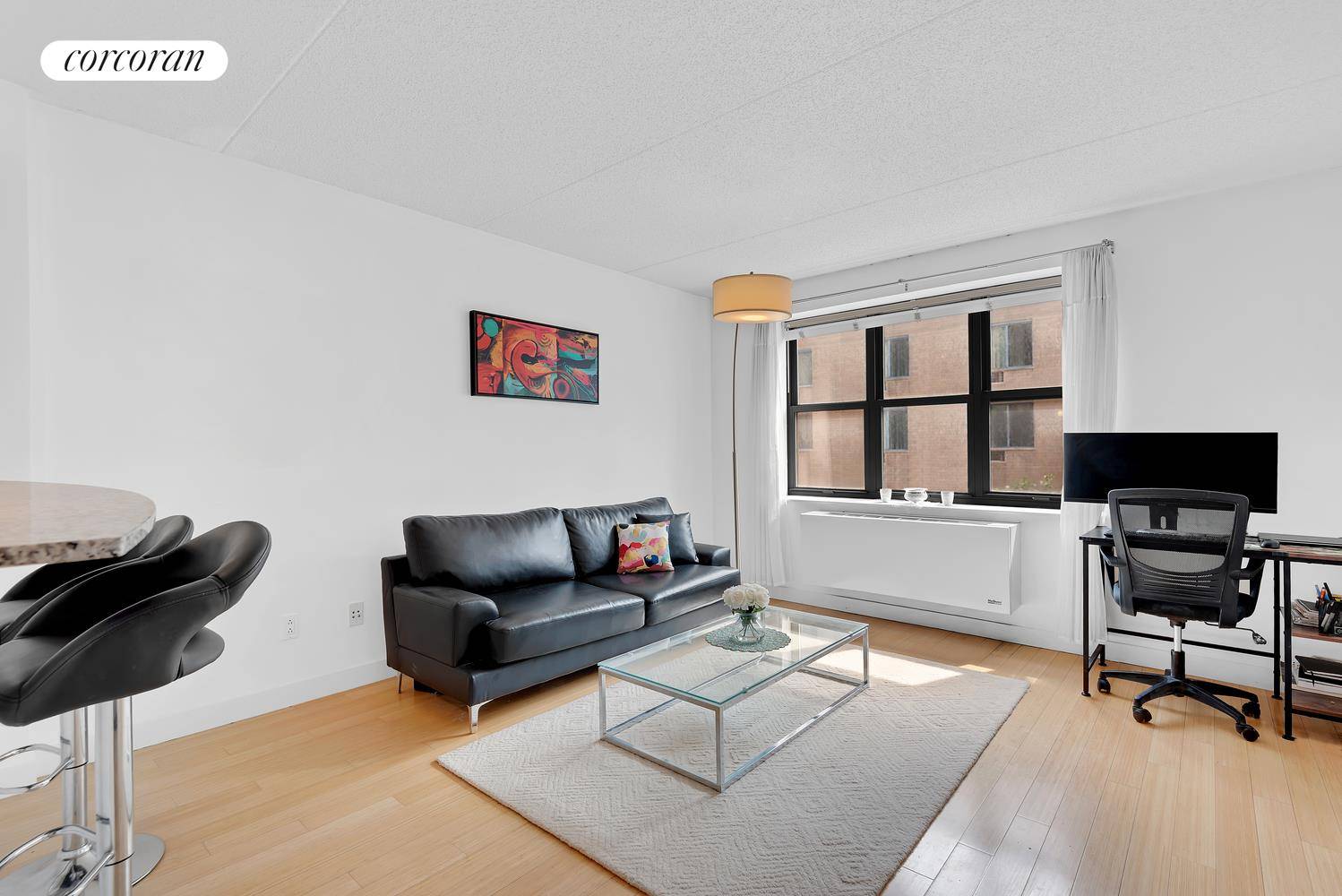 Discover your perfect urban retreat at 516 West 47th Street, Unit S4M, in the heart of vibrant Hell's Kitchen !