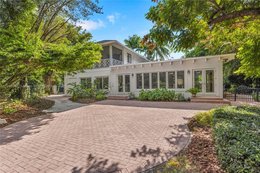 Discover this exceptional 5 bedroom, 3 bath home on a lush 16, 459 Sq Ft lot, the house is beautifully positioned on an elevated parcel with a pathway down to ...