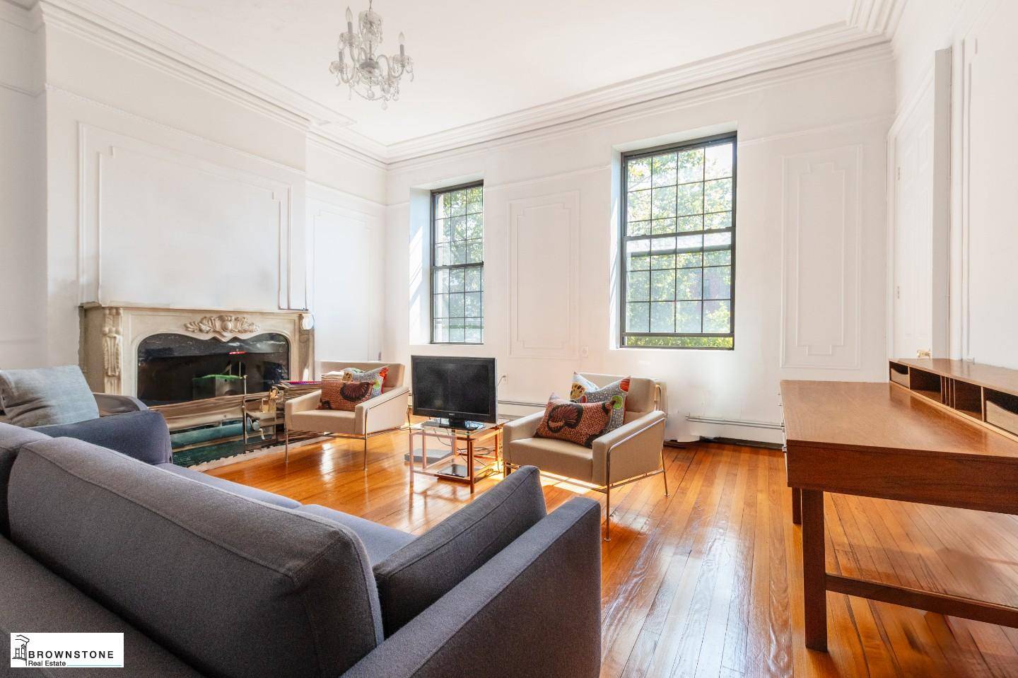 On 2nd Place, a quiet and leafy street in Carroll Gardens, the large front gardens create an atmosphere of privacy and prestige.