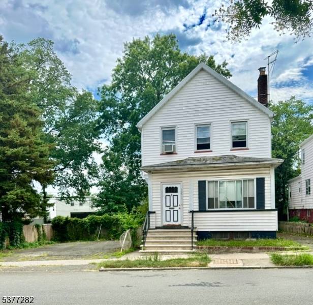 Spacious Colonial Gem on Double Lot !