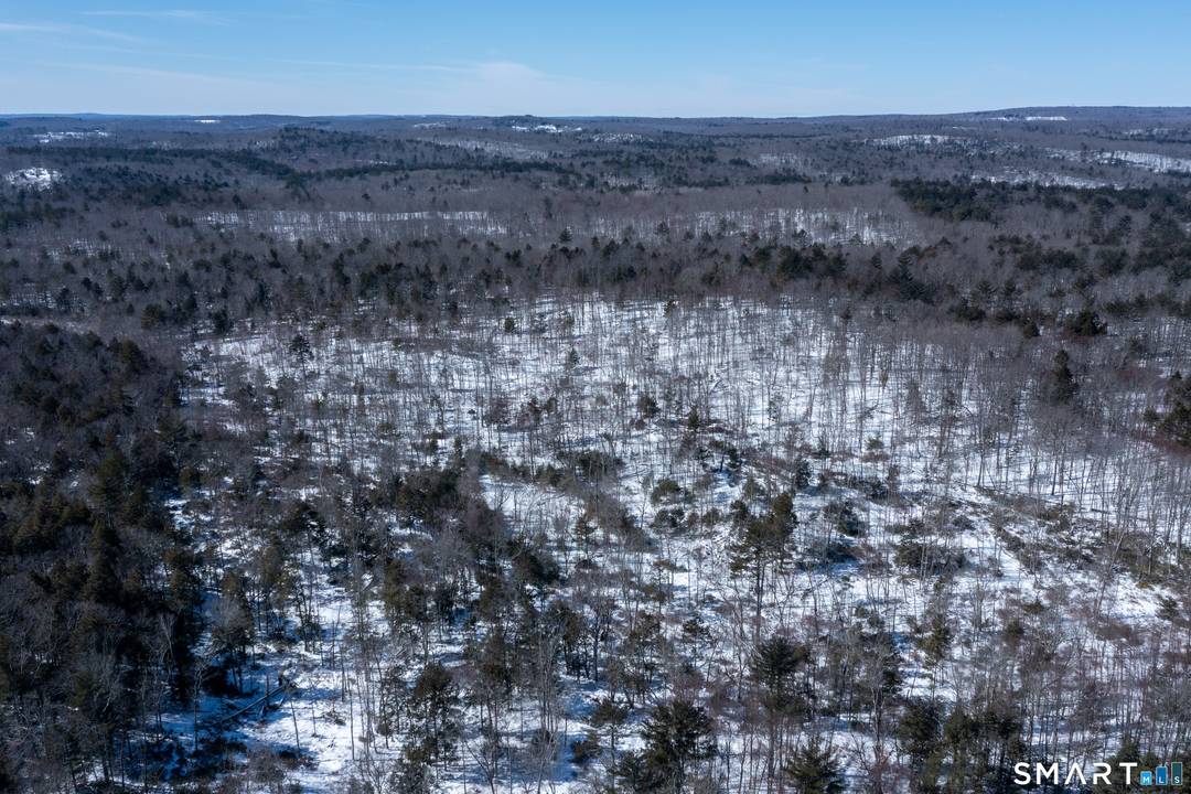 Extraordinary 153 acre parcel nestled in the heart of Connecticut's scenic Last Green Valley, offering exceptional privacy and natural beauty.