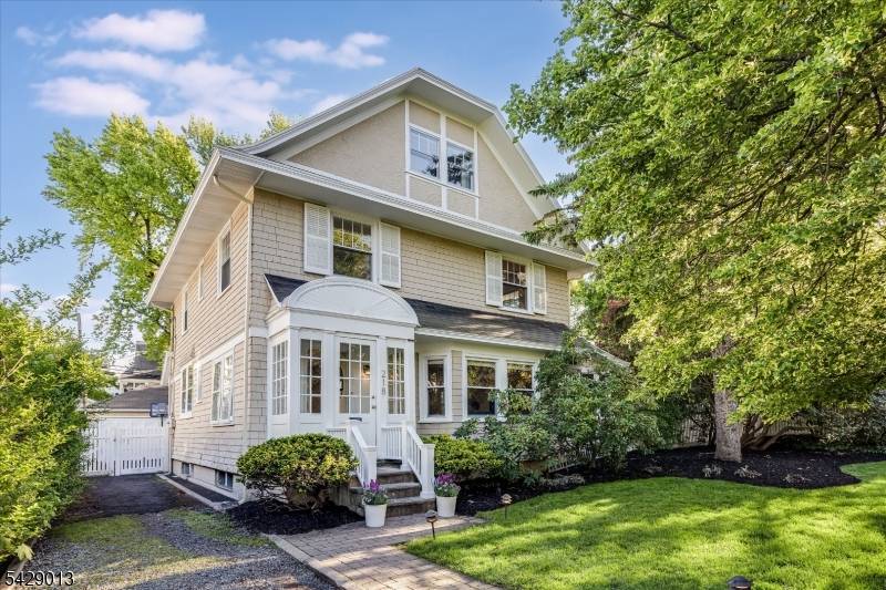 Ideally situated just moments from Upper Montclair Village, this handsome five bedroom, 2.