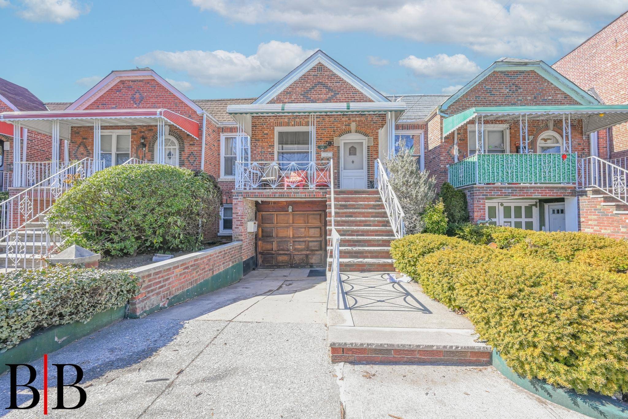 Live and earn ! Fully attached brick 2 family offers 2 bedrooms over 1 bedroom, parquet floors, 9 foot ceilings and private drive with 1 car garage.