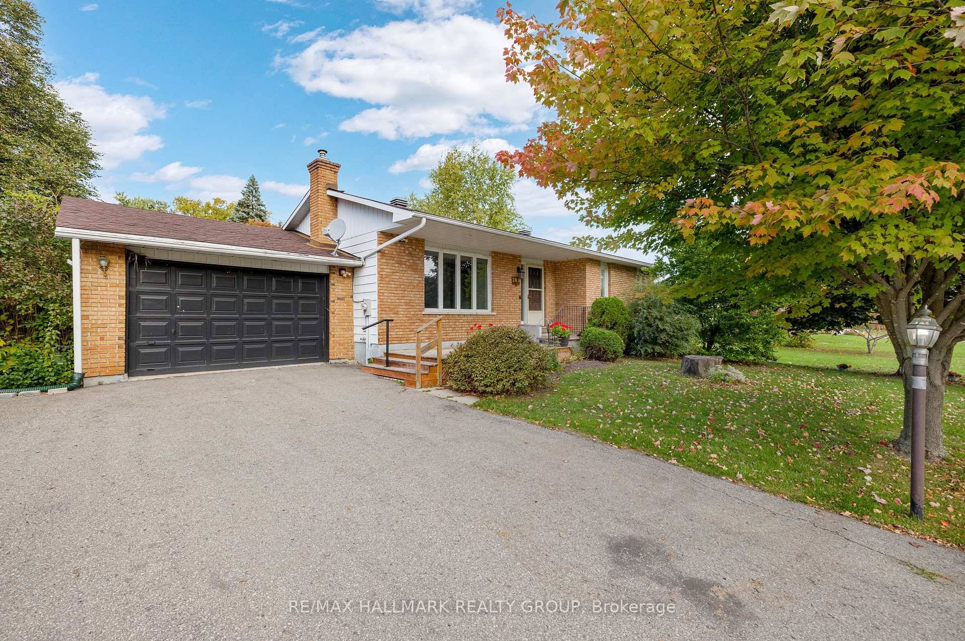 Welcome to 209 Curry Street nestled in central Kemptville, this meticulously cared bungalow is located on a generous town lot, offering both charm and convenience.